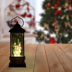 11 In. Tall LED Yellow Lights Lantern Snowman Snow Globe Christmas Holiday Decor, Bronze -Northlight Shop alpine corporation christmas novelty lights qva126bz 4f 1000