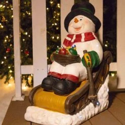 24 In. Tall Solar Snowman In Sleigh With LED Lights, Outdoor Festive Holiday Decor For Garden, Porch, Lawn -Northlight Shop alpine corporation christmas novelty lights zen260slr s tm e1 1000