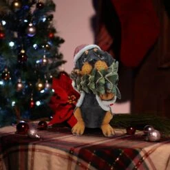 Christmas Santa Black And Tan Puppy Statue With Pine Tree -Northlight Shop alpine corporation christmas yard decorations waz318 31 1000