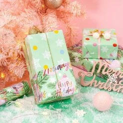 17 In. X 33 Ft. Christmas Wrapping Paper, Green Happy Holiday Lettering Printed For Chrsitmas Holiday Party Celebration -Northlight Shop angel sar christmas wrapping paper ub52sn02 31 1000