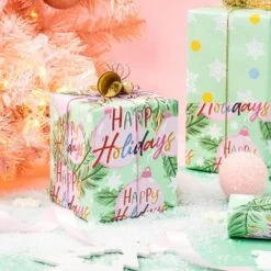 17 In. X 33 Ft. Christmas Wrapping Paper, Green Happy Holiday Lettering Printed For Chrsitmas Holiday Party Celebration -Northlight Shop angel sar christmas wrapping paper ub52sn02 40 1000