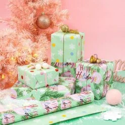 17 In. X 33 Ft. Christmas Wrapping Paper, Green Happy Holiday Lettering Printed For Chrsitmas Holiday Party Celebration -Northlight Shop angel sar christmas wrapping paper ub52sn02 44 1000