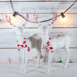 Red And White Peppermint Christmas Reindeer - Holiday White Deer Figurine Statues With Antlers Centerpiece (Pack Of 2) -Northlight Shop christmas centerpieces or 226 4f 1000