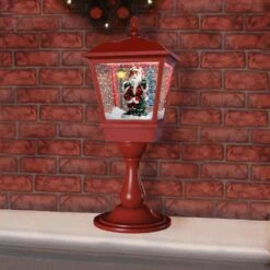 25 In. Christmas Tabletop Musical Snowy Lantern With Sant Scene, Cascading Snow And Christmas Carols -Northlight Shop christmas time christmas figurines ct stl025sqa rd 40 1000