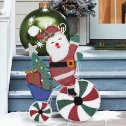 36 In. Multi-Color Fabric Yard Sculpture Christmas Santa On Peppermint Bike Holiday Decoration -Northlight Shop christmas yard decorations whhd1793 31 1000