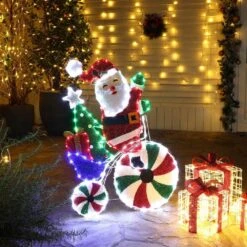 36 In. Multi-Color Fabric Yard Sculpture Christmas Santa On Peppermint Bike Holiday Decoration -Northlight Shop christmas yard decorations whhd1793 4f 1000