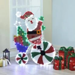 36 In. Multi-Color Fabric Yard Sculpture Christmas Santa On Peppermint Bike Holiday Decoration -Northlight Shop christmas yard decorations whhd1793 c3 1000