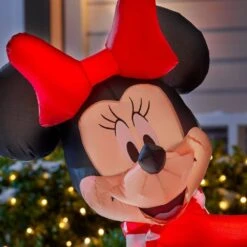 Disney 5 Ft. Animated Inflatable Minnie With Mickey Popping Out Of Present Scene -Northlight Shop disney christmas inflatables 117440 1d 1000