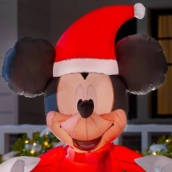 Disney 5 Ft. Animated Inflatable Minnie With Mickey Popping Out Of Present Scene -Northlight Shop disney christmas inflatables 117440 a0 1000