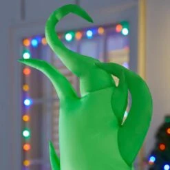 Dr. Seuss 4 Ft Little Grinch Holding Present Holiday Inflatable -Northlight Shop dr seuss christmas inflatables 21gm17629 1d 1000