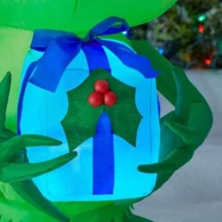 Dr. Seuss 4 Ft Little Grinch Holding Present Holiday Inflatable -Northlight Shop dr seuss christmas inflatables 21gm17629 a0 1000