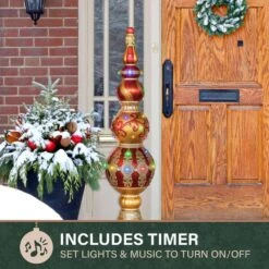 4-ft. Prelit Metallic Christmas Finial Statue With LED Lights And Music, 3D Light Up Resin Decoration 18 4-ft. Prelit Metallic Christmas Finial Statue With LED Lights And Music, 3D Light Up Resin Decoration -Northlight Shop fraser hill farm christmas figurines ffrs048 fin5 rd 1d 1000