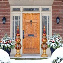 4-ft. Prelit Metallic Christmas Finial Statue With LED Lights And Music, 3D Light Up Resin Decoration 23 4-ft. Prelit Metallic Christmas Finial Statue With LED Lights And Music, 3D Light Up Resin Decoration -Northlight Shop fraser hill farm christmas figurines ffrs048 fin5 rd 1f 1000