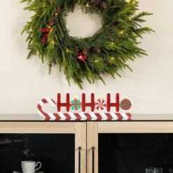 5 In. H Christmas Wooden Epoxy HOHOHO Candy Cane Table Decor -Northlight Shop glitzhome christmas figurines 2009900066 e1 1000