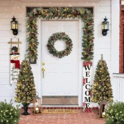 42 In. H Lighted Wooden Poinsettia WELCOME Porch Sign 8 42 In. H Lighted Wooden Poinsettia WELCOME Porch Sign -Northlight Shop glitzhome christmas figurines 2010100026 e1 1000