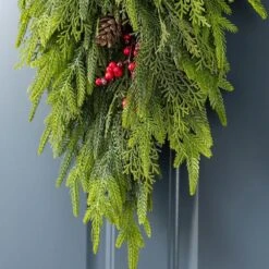 31.5 In. Greenery PE Dripping Artificial Christmas Swag Teardrop With Pinecones And Red Berries -Northlight Shop glitzhome christmas swag 2016000061 44 1000