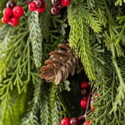 31.5 In. Greenery PE Dripping Artificial Christmas Swag Teardrop With Pinecones And Red Berries (Set Of 2) -Northlight Shop glitzhome christmas swag 2016000088 44 1000