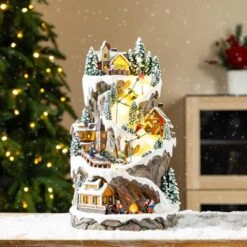 15.50 In. Lighted Skiing Moutain Resin Christmas Village With Movement And Music -Northlight Shop glitzhome christmas villages 2040200001 31 1000