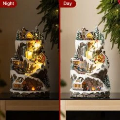 15.50 In. Lighted Skiing Moutain Resin Christmas Village With Movement And Music -Northlight Shop glitzhome christmas villages 2040200001 76 1000