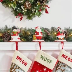 6.25 In. H Set Of 3 Resin Santa, Snowman, Penguin Stocking Holder -Northlight Shop glitzhome stocking holders 2005000041 4f 1000