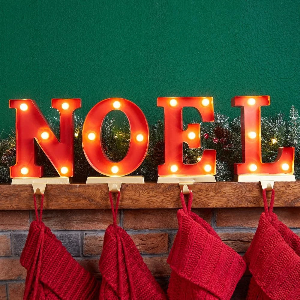 8.5 In. H Metal Noel Christmas Stocking Holder With LED (Set Of 4) 1 8.5 In. H Metal Noel Christmas Stocking Holder With LED (Set Of 4)