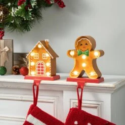 Marquee LED Gingerbread House And Gingerbread Man Christmas Stocking Holder (2-Count) -Northlight Shop glitzhome stocking holders 2005000069 e1 1000