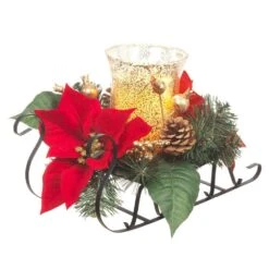 Home Accents Holiday 8.5 In. H Metal Sleigh With Poinsettias And LED Timer Candle In Glass Hurricane