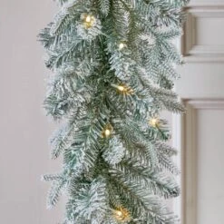 Home Accents Holiday 9 Ft Starry Light Battery Operated Flocked Frasier Fir LED Pre-Lit Garland With Timer -Northlight Shop home accents holiday christmas garland 2560130hd 1 77 1000