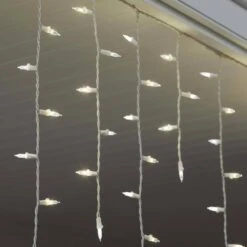 23.5 In. High X 84 In. Wide 70-Light White Christmas LuxeSparkle Icicle Light String Diamond White -Northlight Shop icicle lights 21gm18857 a0 1000