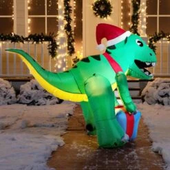 5 Ft. Tall X 3 Ft. W, Green, Red And Blue Plastic Christmas Dinosaur With Hat Inflatable -Northlight Shop joyfy christmas inflatables 30057 44 1000