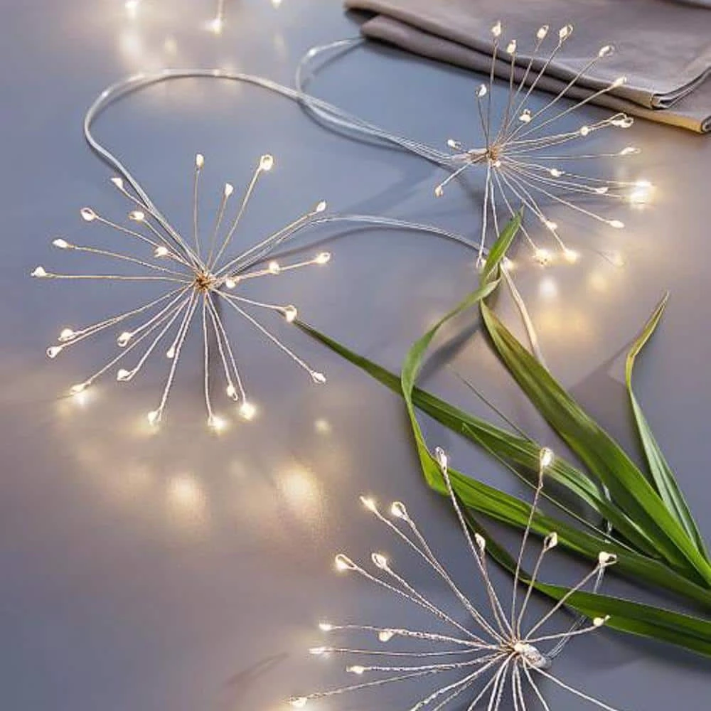 Battery Operated Starburst Garland String Lights With Soft White Lights 2 Battery Operated Starburst Garland String Lights With Soft White Lights - Image 2