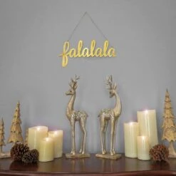 19 In. Gold Metal HGTV Home Collection "Falalala" Hanging Wall Decoration -Northlight Shop national tree company christmas wall decorations hgtse96 0401811 31 1000