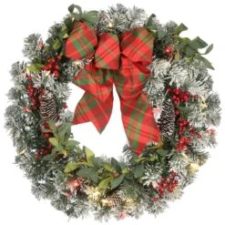 24 In. General Store Snowy Artificial Christmas Wreath With LED Lights And Bow