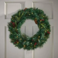 24 In. Green Battery Operated Pre-Lit Warm White LED Mixed Pine Artificial Christmas Wreath With Berries 10 24 In. Green Battery Operated Pre-Lit Warm White LED Mixed Pine Artificial Christmas Wreath With Berries -Northlight Shop noble house christmas wreaths 83580 44 1000