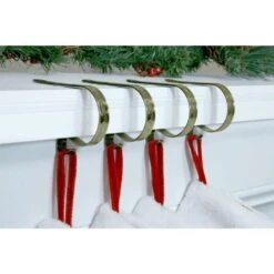 2.5 In. Metal Antique Brass Embossed Holly Stocking Holder (4-Pack) -Northlight Shop original mantleclip stocking holders mc0421 40 1000