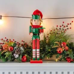 15 In. Wooden Christmas Elf Holiday Nutcracker-Red And Green Elf With Candy Cane And Gift Box Holiday Nutcracker Decor 9 15 In. Wooden Christmas Elf Holiday Nutcracker-Red And Green Elf With Candy Cane And Gift Box Holiday Nutcracker Decor -Northlight Shop ornativity christmas figurines or 169 1f 1000