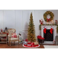 STERLING 7.5 Ft. Natural Cut Narrow Lincoln Pine Artificial Christmas Tree With 300 Clear Lights -Northlight Shop sterling pre lit christmas trees 5620 75c 4f 1000