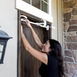 White Single Door Garland Hanger (for 34 In. Artificial - 52 In. Artificial Wide Doors) 15 White Single Door Garland Hanger (for 34 In. Artificial - 52 In. Artificial Wide Doors) -Northlight Shop village lighting company wreath hangers v 20720 wht 1f 1000