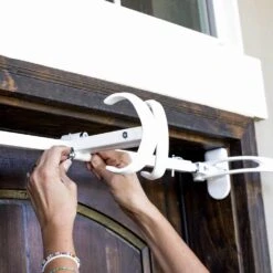 White Single Door Garland Hanger (for 34 In. Artificial - 52 In. Artificial Wide Doors) 16 White Single Door Garland Hanger (for 34 In. Artificial - 52 In. Artificial Wide Doors) -Northlight Shop village lighting company wreath hangers v 20720 wht 44 1000